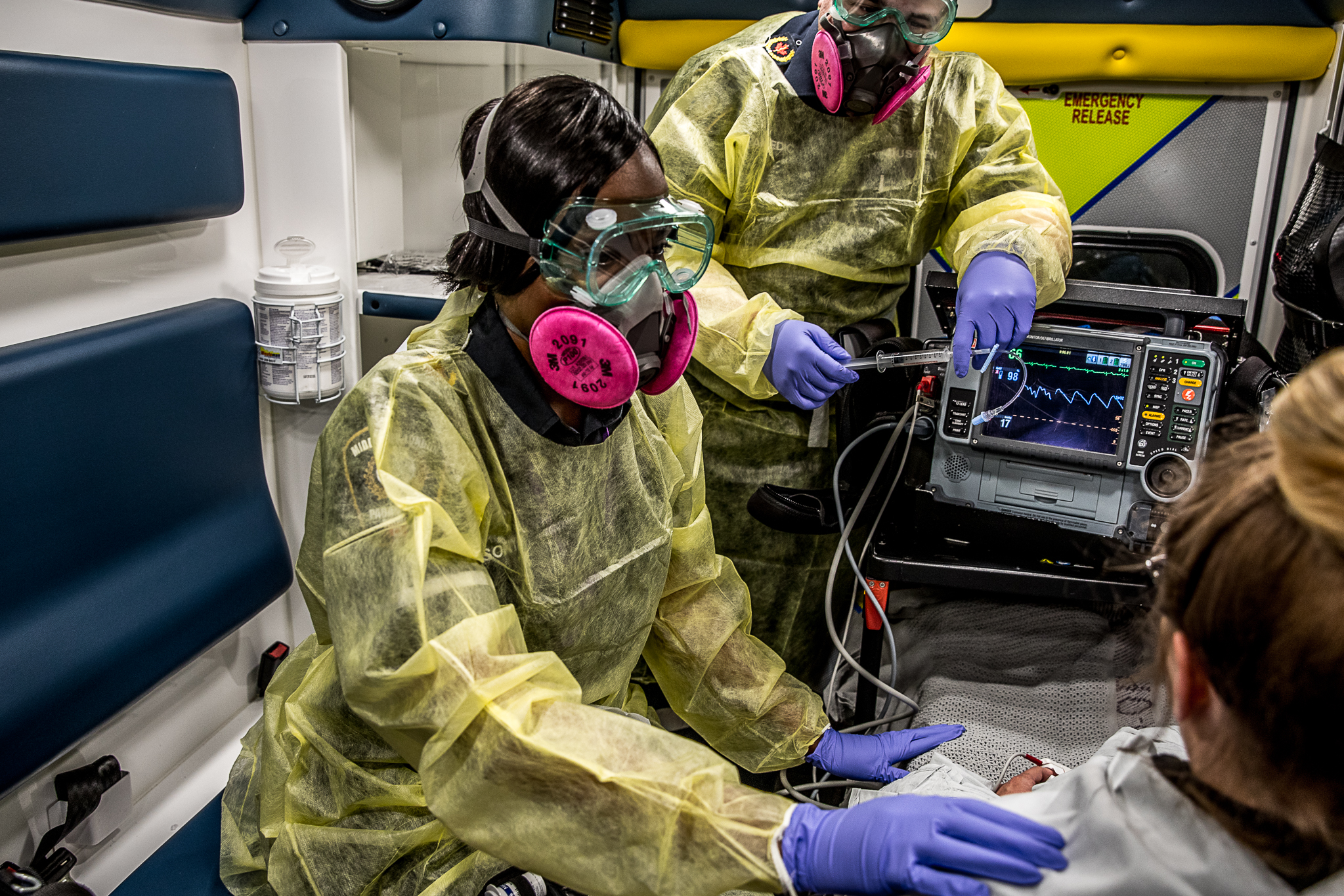 Two paramedics wearing ppe