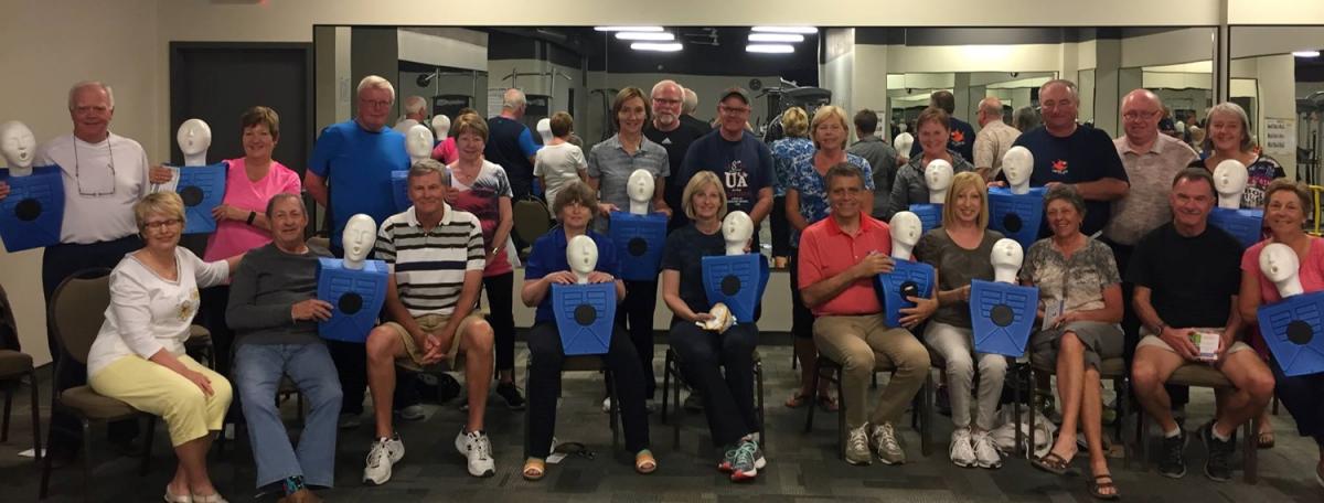 Picture of people in workplace receiving EMS training